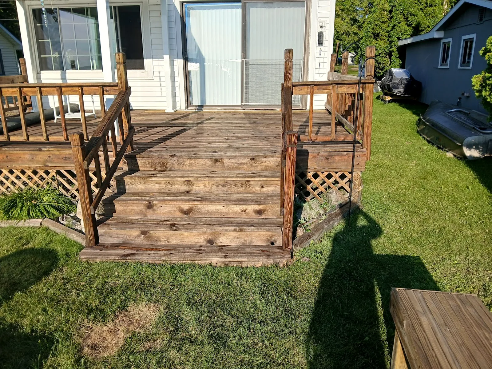 Finished deck entry with stairs and railings