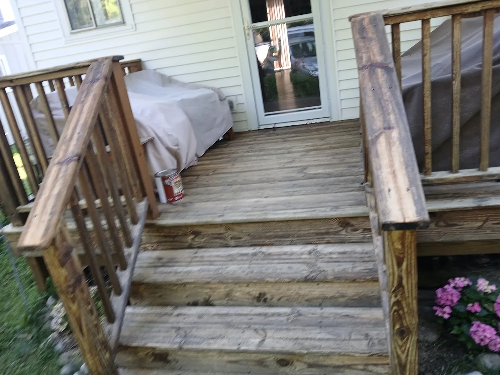 Deck stairs and handrails at an entry
