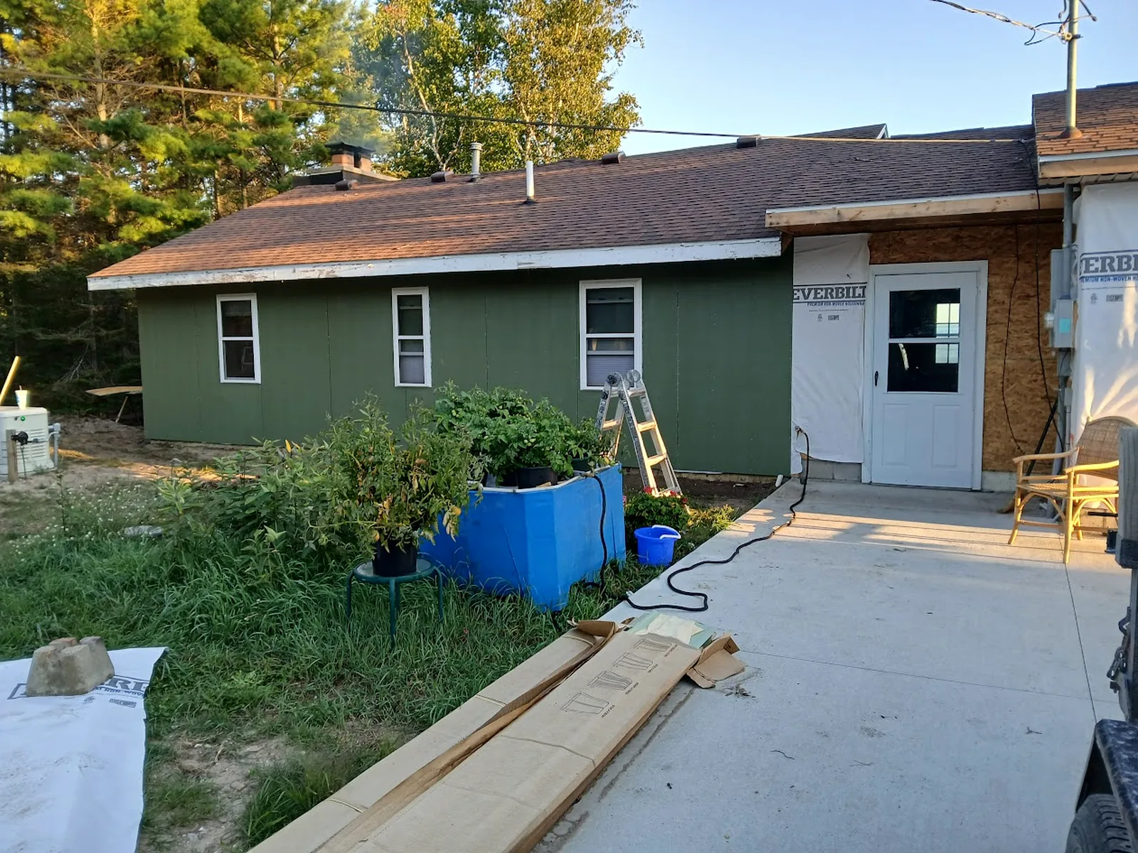 Finished green exterior siding and trim update