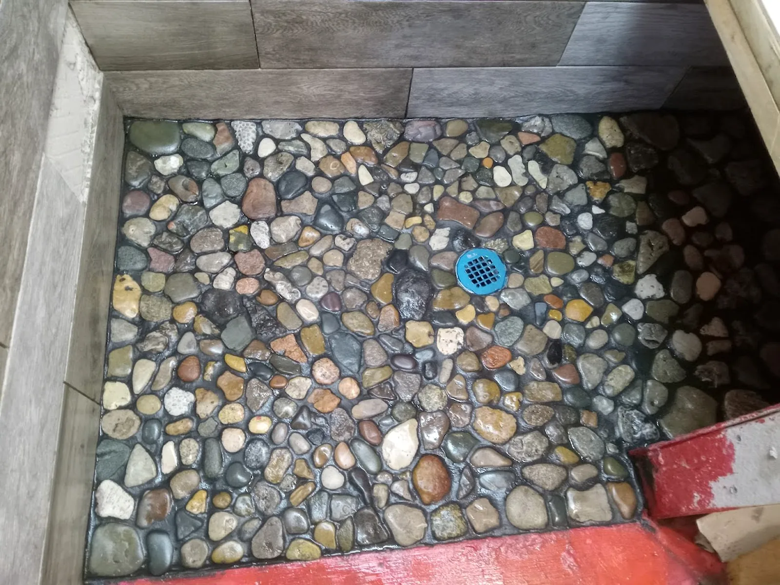 Stonework floor detail in a shower area